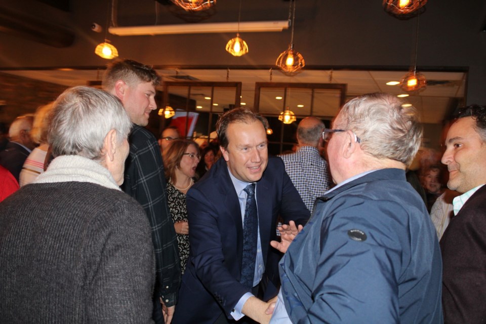 Mayor-elect Paul Lefebvre is seen cheering with supporters at The Daventry Kitchen and Bar on Regent Street shortly after results began rolling in showing him in a decisive lead.