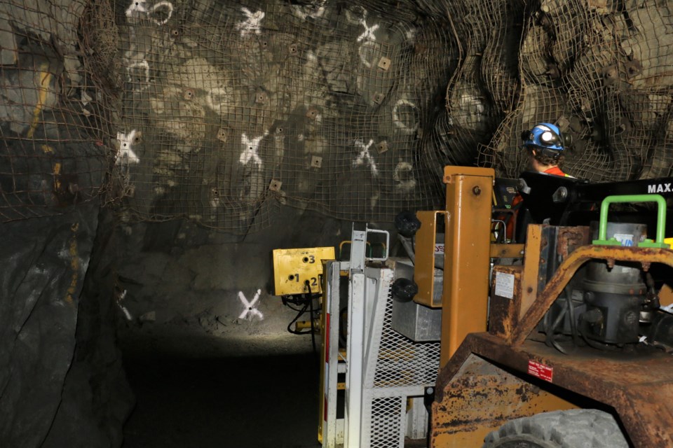 Billy Bartels of TesMan demonstrating a robotic powder loader at the NORCAT mine.