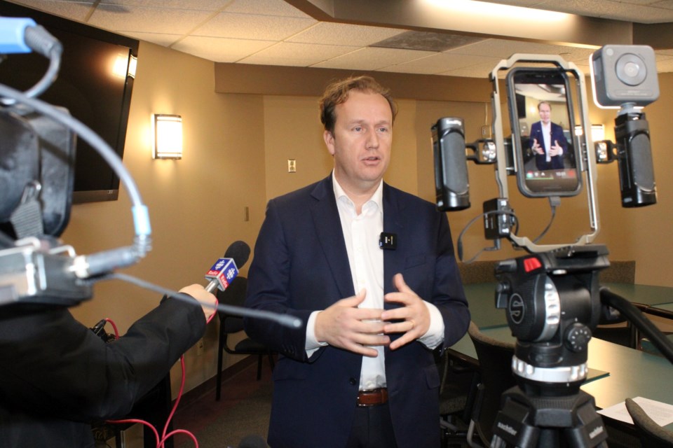 Mayor Paul Lefebvre is seen speaking to local media about the city’s new Chief Financial Officer at Tom Davies Square on Friday.