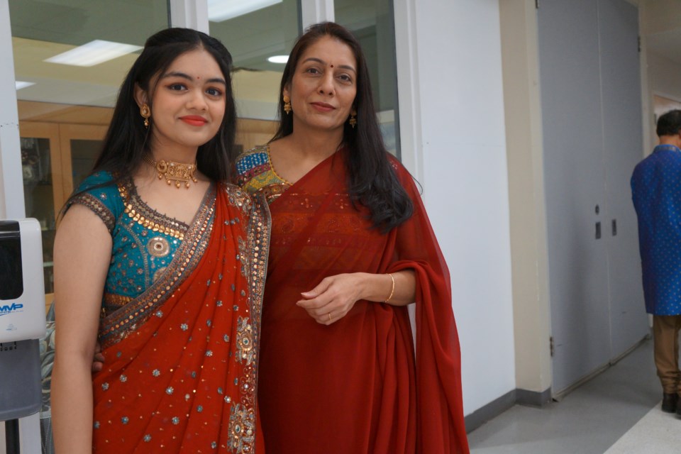 Vidhi Patel stands with her mother, Reena, at the India Republic Day event on Jan. 28.                               