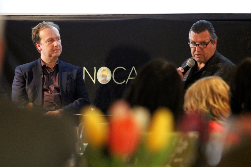 Mayor Paul Lefebvre and Northeastern Ontario Construction Association executive director Mark Kivinen are seen heading Thursday night’s “Fireside Chat,” hosted by the association at Verdicchio Ristorante. 