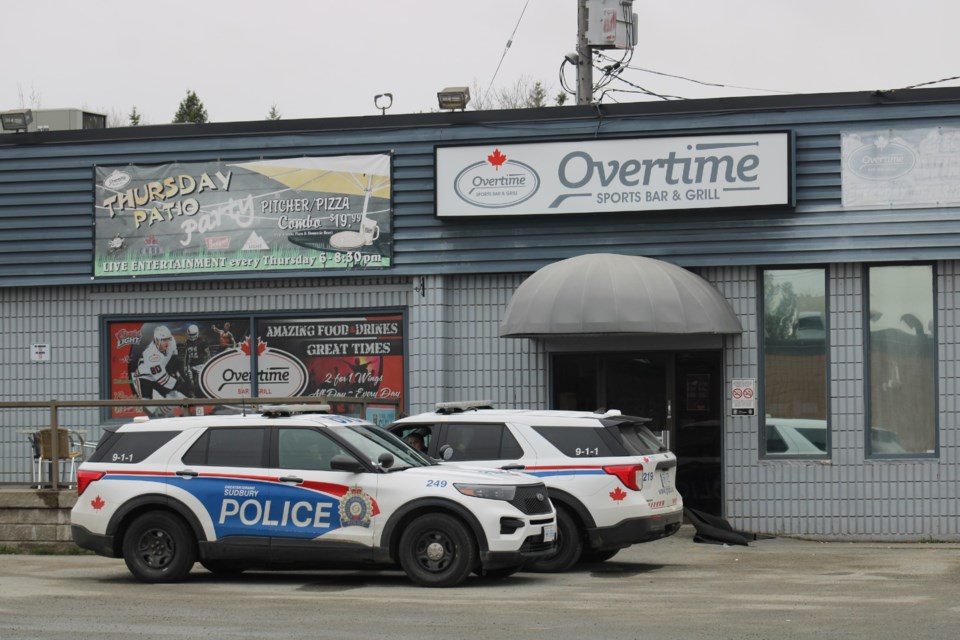 A man was fatally shot at Overtime Sports Bar and Grill on Notre Dame Avenue at approximately 10:30 p.m. Friday. Police are seen on site Saturday morning.