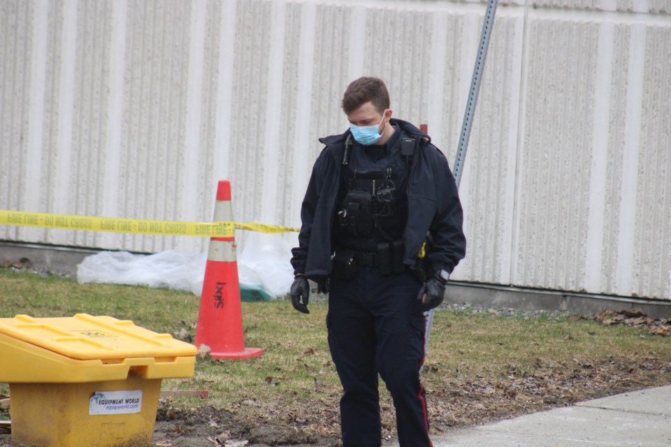 A GSPS officer stands outside the Canada Revenue Agency Taxation Centre in Sudbury. Police are investigating a suspicious package, which has now been removed from the building. Tyler Clarke/Sudbury.com

