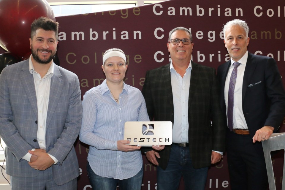 A presentation plaque was created for the BESTECH donation event on May 4. Those taking part included, left to right, Cambrian College applied research director Mike Commito, student Kristi Pugliese, BESTECH president Pat Fantin, and Cambrian interim president Shawn Poland. 