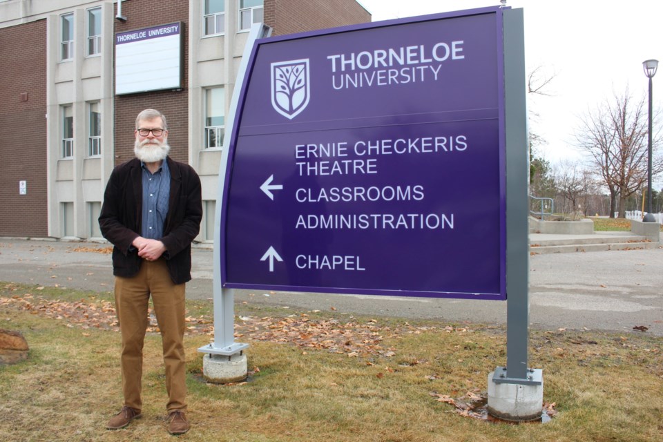 Thorneloe University president John Gibaut poses outside of the university’s building, which is situated on Laurentian University’s campus.