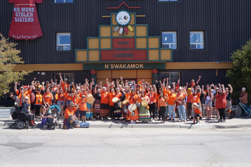 A group photo taken ahead of the walk that began at 110 Elm Street, the participants walked to Bell Park for a ceremony. 