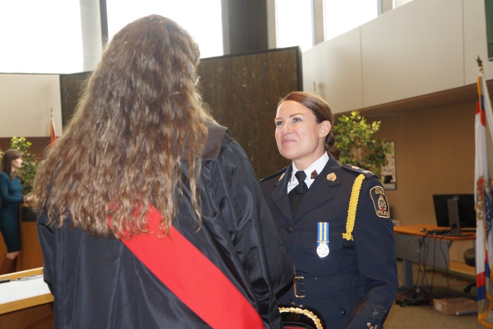 Deputy Chief Natalie Hiltz speaks with Justice Karen Lische in advance of her swearing in ceremony. 