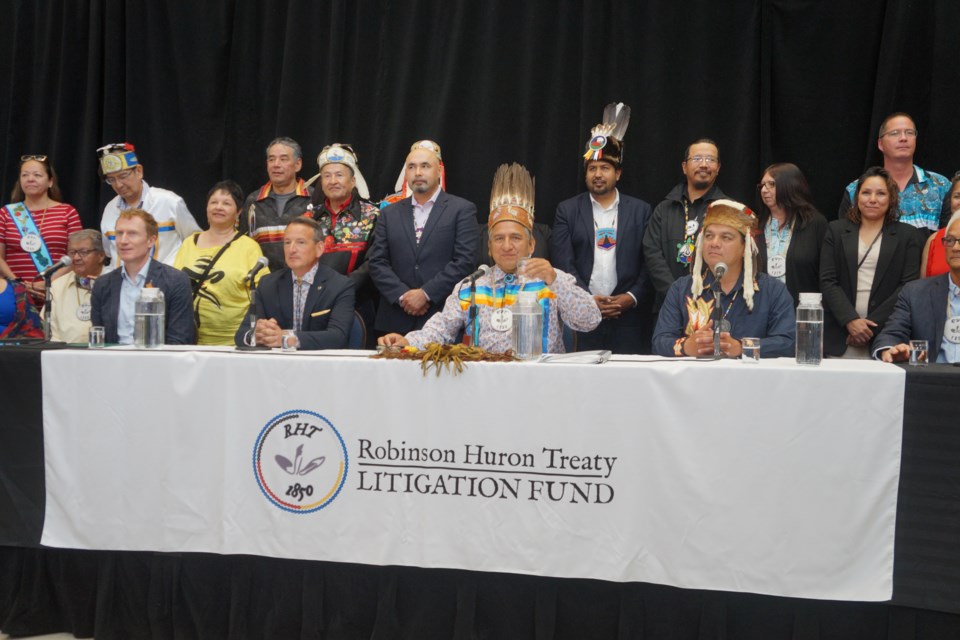 Elders and chiefs from the 21 First Nation signatories of the Robinson Huron Treaty at the June 17 annouement of the proposed settlement. Atikameksheng Ansihnawbek Gimaa Craig Nootchtai stands left and behind Gimaa Dean Sayers (centre).                              