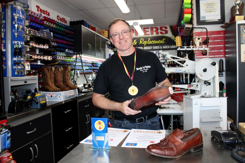 Sudbury cobbler Daniel Frappier is seen at his business, Heels ‘n’ Soles, at Montrose Mall on Lasalle Boulevard this week after being the only Canadian to receive a gold medal and trophy of honour at Inter-Schuh-Service ISS 2023, Germany’s international shoe repair competition. Pictured with him are his awards, as well as the pair of shoes he repaired to earn his recognition.
