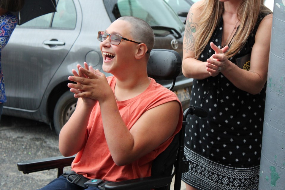 Ben Paré’s million-dollar smile said it all Saturday afternoon after the 15-year-old Sudburian received the gift of an adaptive tricycle from the Sunshine Foundation of Canada.