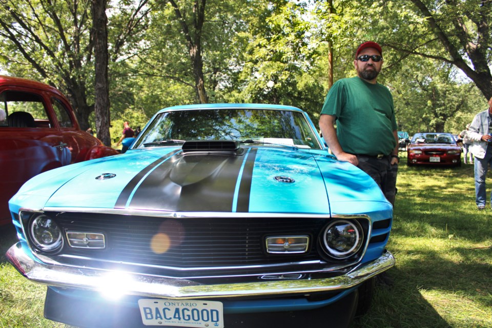 Mike Chezzi is seen with his 1970 Ford Mustang, which has been in his family, off and on, since it was brand new. He is pictured during the Sudbury CARes motorsports event in Copper Cliff on Sunday.
