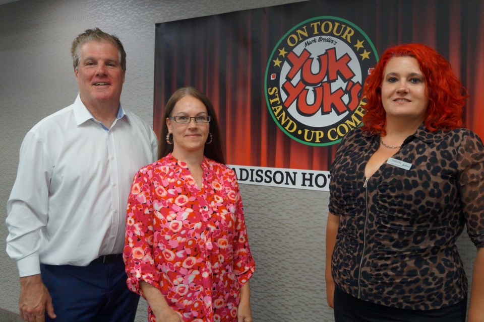 Brian Band (left) stands with local comedian, Lesley Lynn, (centre) and Chantal Dufresne, sales manager, Radisson Hotel Sudbury. 