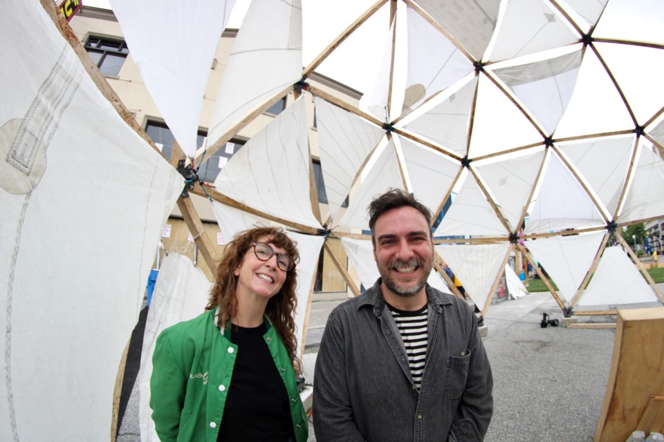 We Live Up Here “top banana” Jaymie Lathem and co-founder Christian Pelletier are seen in a geodesic dome set up in the middle of Durham Street downtown, during the launch of this year’s festival on Friday afternoon.
