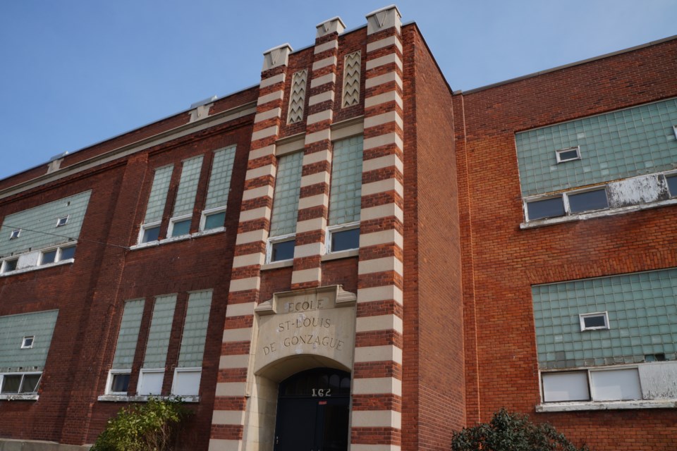 After several years of community work, the Art Deco exterior facade of the century-old École Saint-Louis-de-Gonzague at 162 MacKenzie St. has been designated as a heritage building under the Ontario Heritage Trust. 
                     