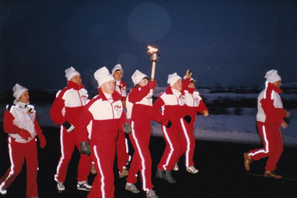 080824_then_now_olympic_torch_1