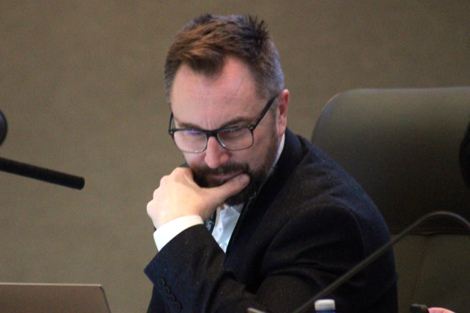 It’s “obvious” the city needs to reduce its road network, Ward 5 Coun. Mike Parent said in addressing the city’s almost $80-million annual funding shortfall toward asphalt rehabilitation. Parent is pictured in thought during Monday’s operations committee meeting.