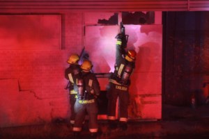 Overnight fire at former hospital on Paris St. suspicious, says deputy chief