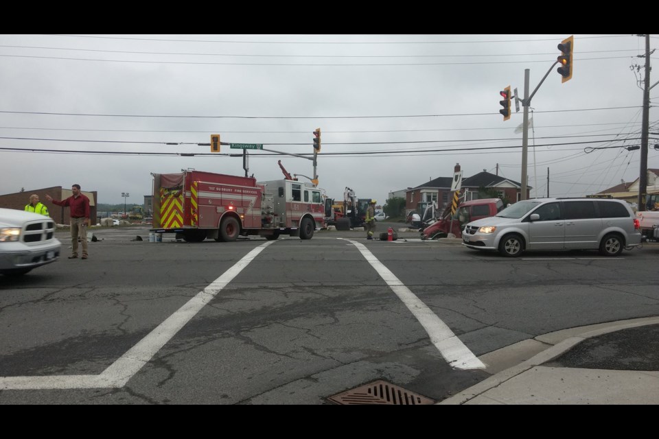 The driver of a red pickup truck that collided with a beige sedan on The Kingsway June 29 was allegedly intoxicated at the time of the crash, Sudbury.com has learned. Police say the 35-year-old man driving the truck lost control of the vehicle, struck a light pole and traffic light, crossed the centre line and collided with the sedan in the oncoming lane. (Mark Gentili/Sudbury.com)