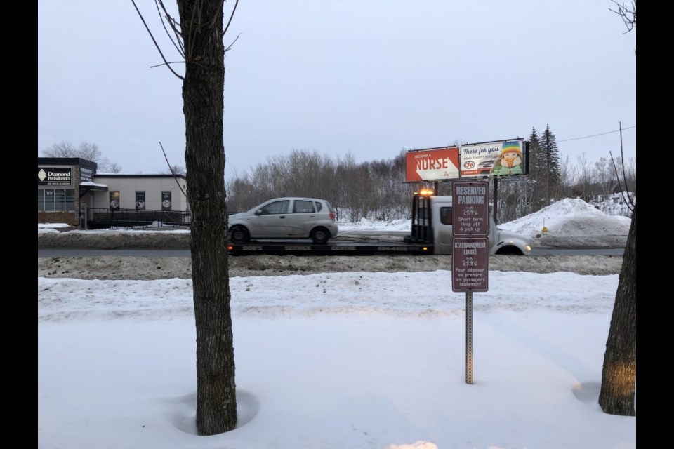 The suspect crashed the first stolen vehicle into a snowbank in front of the CAS building near Notre Dame Ave. (Nick Liard/92.7 Rock and KiSS 105.3)