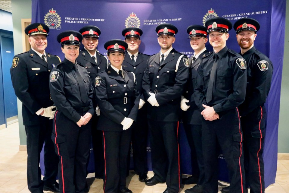 Greater Sudbury Police Service Chief Paul Pedersen is seen with the eight members sworn in during a ceremony at police headquarters on Wednesday. From left is Pedersen, Stephanie Sparks, Jeremiah Cooper, Kairene Alisappi, Alexandru Ivanov, Patrick Whalen, Darcy Godin, Michael Sparks, and Marc-Andre Vaillancourt. 
Supplied
