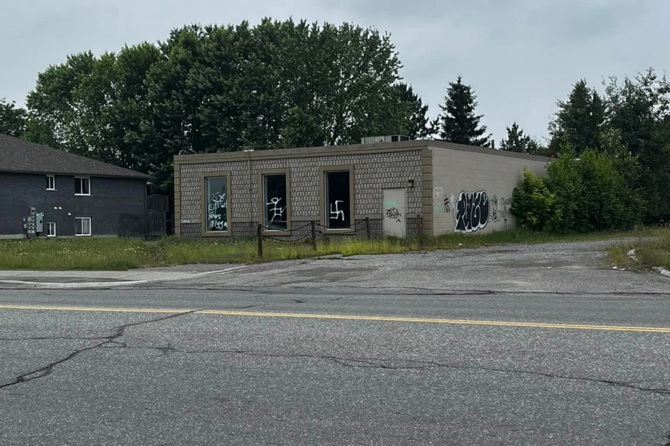 A building located at 6190 Regional Road in Hanmer has been vandalized with hate speech and symbols. 
the next photo in this gallery contains a close up of the images, which may be distressing. 