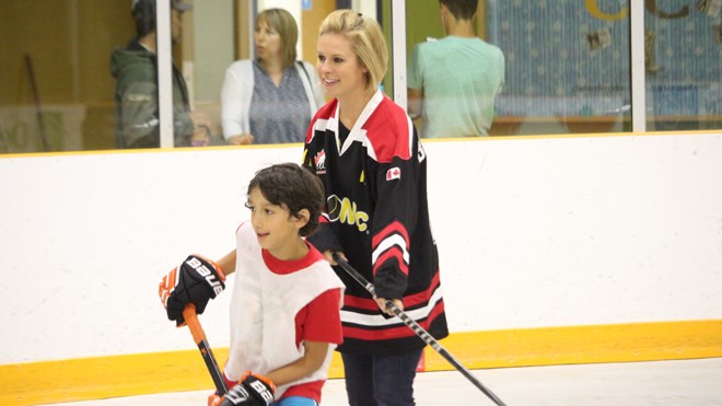 Tessa Bonhomme made a return to her old stomping grounds on June 6 as one of three McDonald's atoMc Hockey ambassadors and played a game of pickup hockey with the Rayside Balfour atoMc Tigercats at the Chelmsford Arena. Photo: Matt Durnan