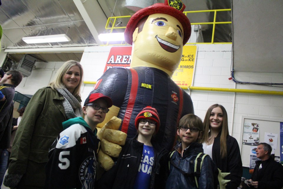 Toronto may have won the Fire Fighters' Cup with a 4-3 victory, but everyone was playing for the same cause - nine-year-old Hudson Fletcher, who is battling cancer. Pictured left to right: Hudon's mother Natalie Fletcher, friend Dominique Michaud, Hudson Fletcher, friend William Natti and Hudson's sister Dylan Fletcher. (Heather Green-Oliver)