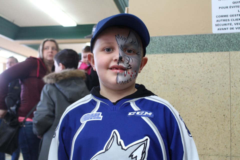 Stephane Robillard shows off his Wolves face paint prior to Tuesday's game. (Matt Durnan)