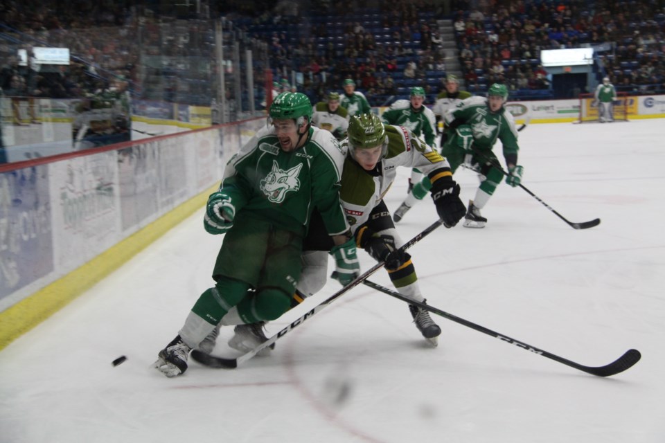 The Sudbury Wolves and North Bay Battalion played a scrappy, hard fought game on Friday night. Photo: Matt Durnan