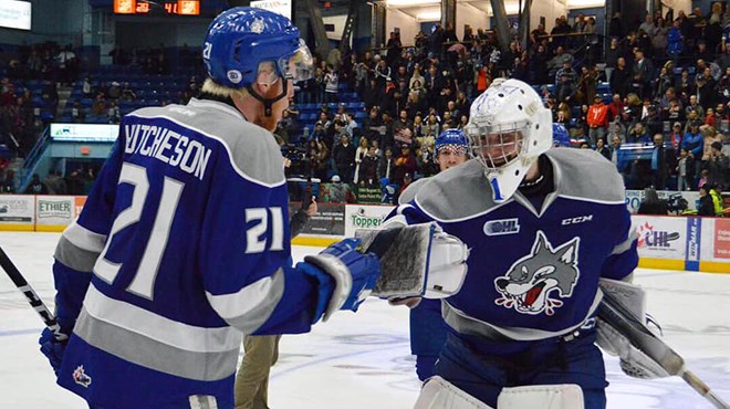 Wolves' Nolan Hutcheson (left) and Ukko-Pekka Luukkonen at (right) at the Sudbury Arena, during the team's 3-2 defeat of the Mississauga Steelheads (Supplied)