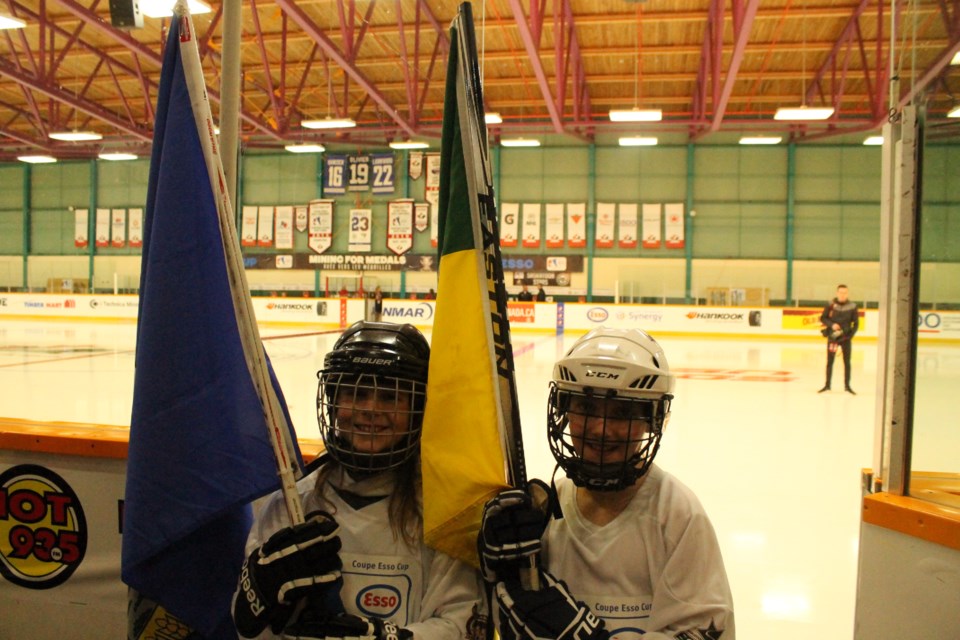 Olivia Hayes and Keira Brisco were the official flag bearers for Alberta and Saskatchewan on Tuesday afternoon. (Annie Duncan/Sudbury.com)
