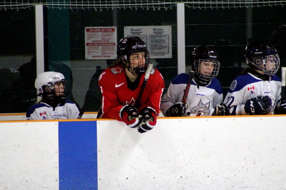 Team Canada Olympic hockey player Rebecca Johnston rides the bench during a scrimmage with members of the Lady Wolves, her former team. (Matt Durnan / Sudbury.com)