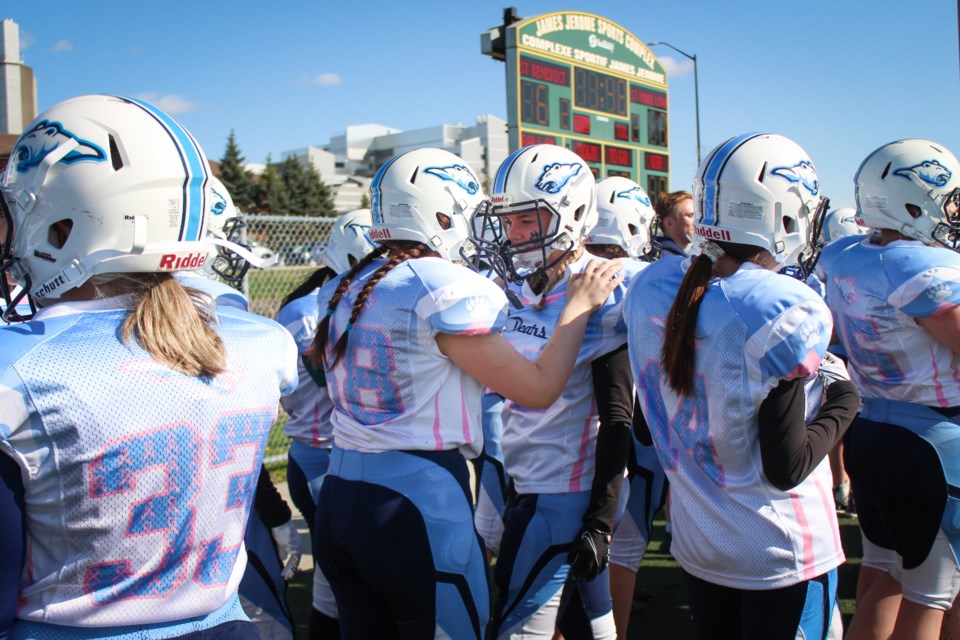 There are 42 members of the Bears girls tackle football team. 
