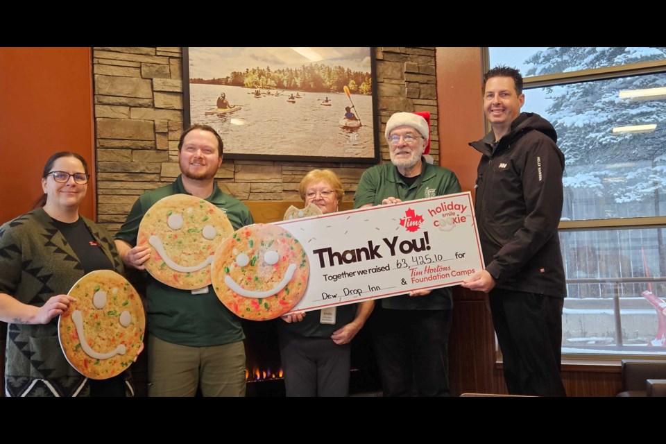 Dew Drop Inn receives a cheque from the Tim Hortons Holiday Smile Campaign at the Tim Hortons on River Street on Dec. 9. 