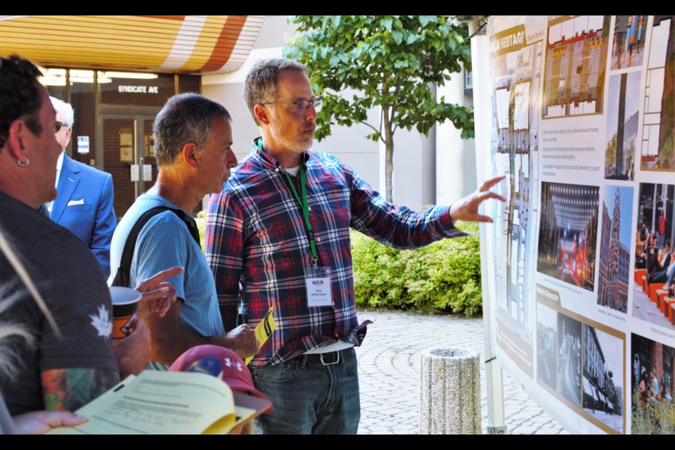 Ray Offman, a project manager with KGS Group, walks attendees at Tuesday's open house through potential designs for the reopening of Victoria Avenue. (Ian Kaufman, TBnewswatch)