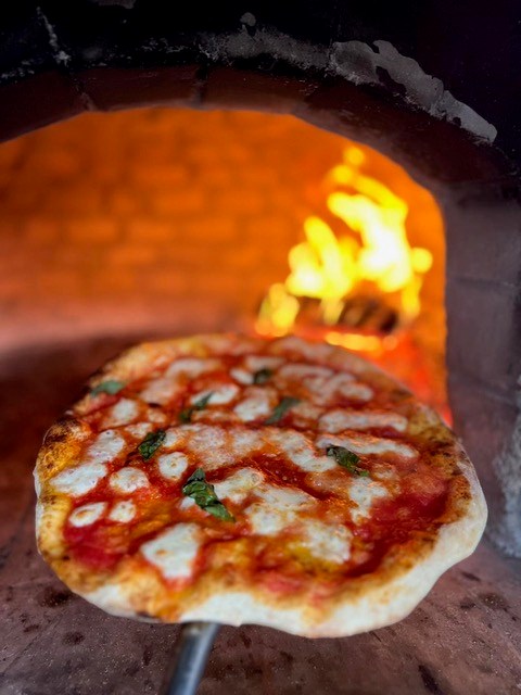 Lento credits his signature dough for the unique appeal of his pizza. (Submitted photo)