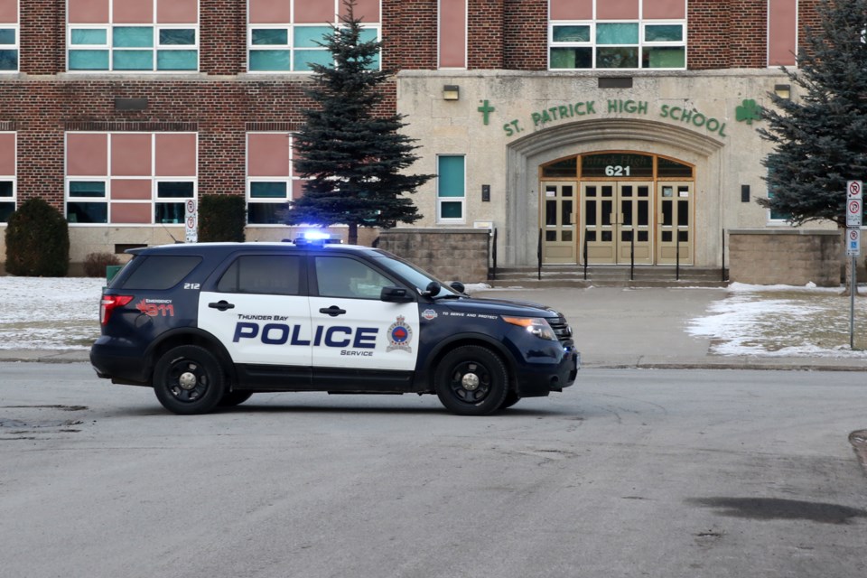Thunder Bay Police restrict access to Selkirk Street in front of St. Patrick High School on Friday, Dec. 16, 2016 after a threat was emailed to school officials (Leith Dunick, tbnewswatch.com). 
