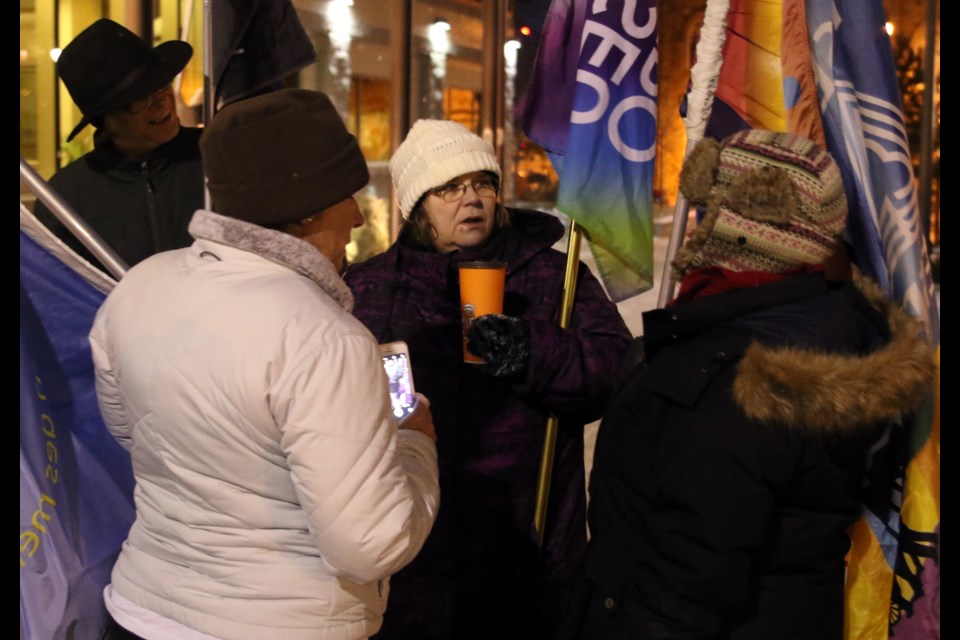 OPSEU corrections workers rally outside of city hall prior to Monday's city council meeting. 