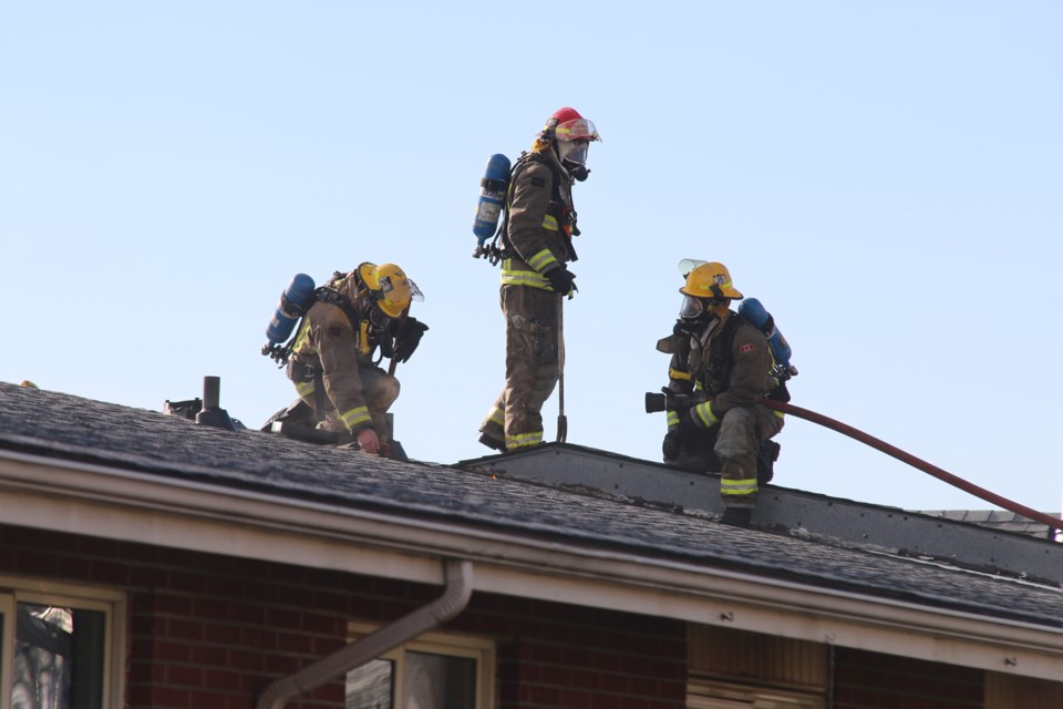 Firefighters on Roof