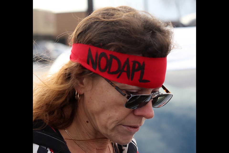 A protestor gets set to demonstrate in support of clean water and against oil pipelines on Monday, Dec. 5, 2016 in Thunder Bay (Leith Dunick, tbnewswatch.com). 