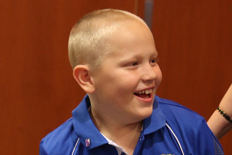 Nine-year-old Alex Haapa-aho after having his head shaved, the culmiination of a year-and-a-half fundraising effort for the Northern Cancer Fund. He collected more than $10,000. 