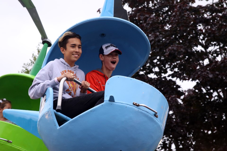 Bryson Biloski (left), cousin of Ethan Biloski enjoying a ride at the CLE on Speical Needs Day. (Michael Charlebois, tbnewswatch.com)