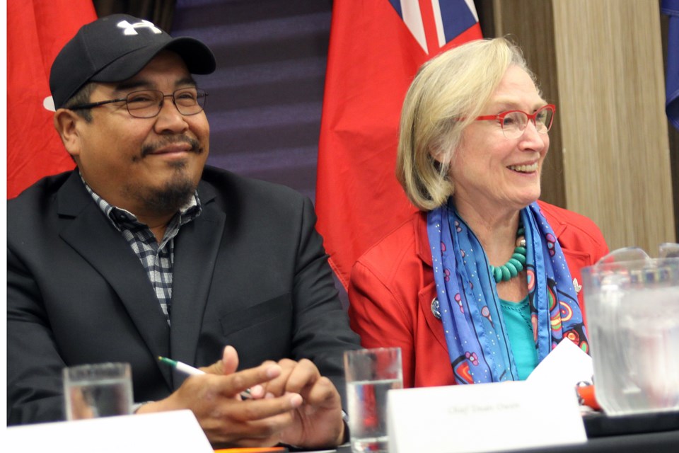 Pikangikum First Nation Chief Dean Owen and Indigenous and Northern Affairs Minister Carolyn Bennett attend a Thursday morning news conference announcing the connection of Pikangikum to the energy grid. (Matt Vis, tbnewswatch.com)