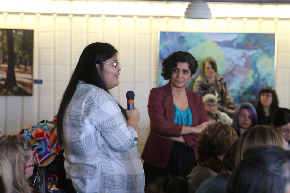 Aftab Erfan (right), listens to a participant during the Conversations Across the Racial Divide at Lakehead University on Monday, an open discussion on racism in Thunder Bay. 