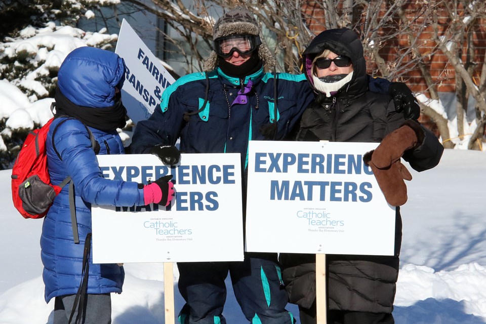 Locked-out teachers picket the offices of the Thunder Bay Catholic District School Board on Wednesday, Feb. 8, 2017 (Leith Dunick, tbnewswatch.com). 