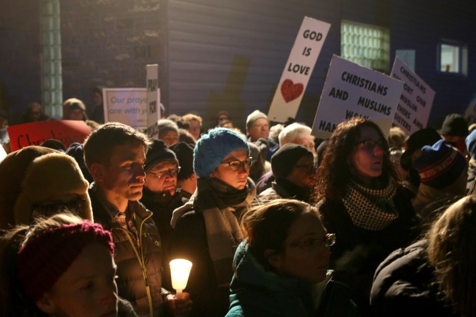 Hundreds of people gathered outside the Thunder Bay Masjid Tuesday evening to honour and remember the victims of the deadly shooting in Quebec City last Sunday. (Photos by Doug Diaczuk - Tbnewswatch.com). 