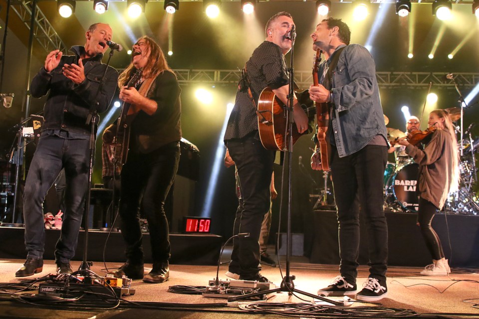 Barney Bentall (left) and Alan Doyle join the Barenaked Ladies on stage at the Thunder Bay Blues Festival on Saturday, July 8, 2017 at Marina Park (Leith Dunick, thnewswatch.com). 