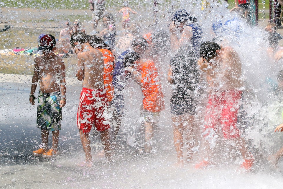 Youngsters beat the heat at the North End splash pad on Friday, July 28, 2017 (Leith Dunick, tbnewswatch.com). 