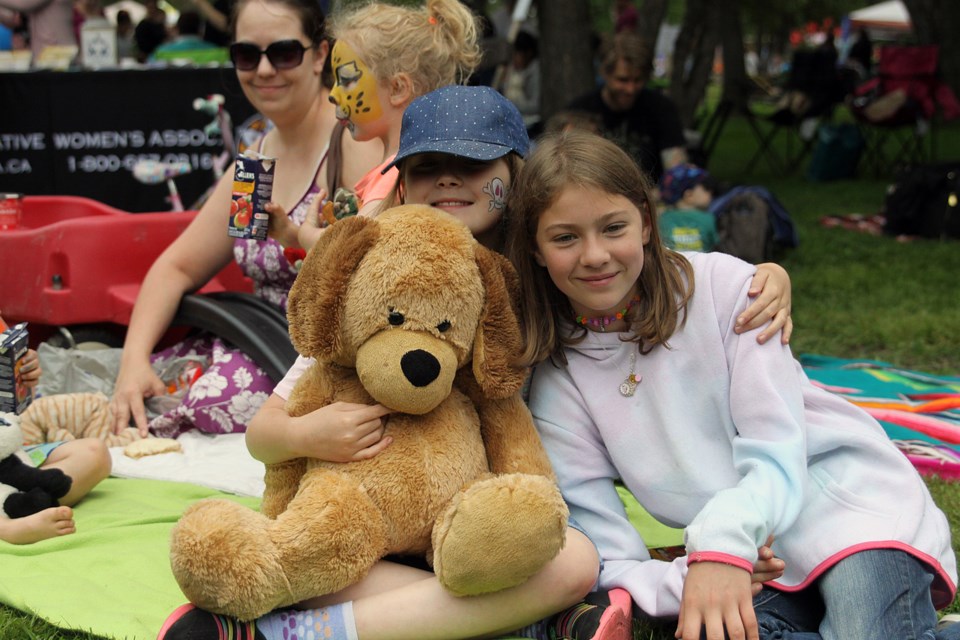 Emily McLeod and Mia Polonoski enjoy the 35th annual Teddy Bear's Picnic at Vickers Park. 
(Matt Vis, tbnewswatch.com)
