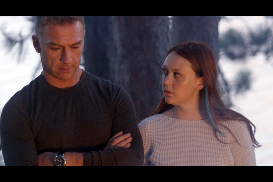 Trevor, played by Bill Pozzobon and Lauren, played by Hannah Ehman in a scene from the film, Autumn Springs. 